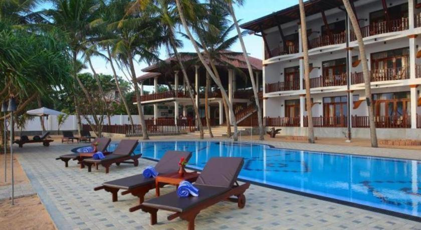 Whispering Palms Отель 3*